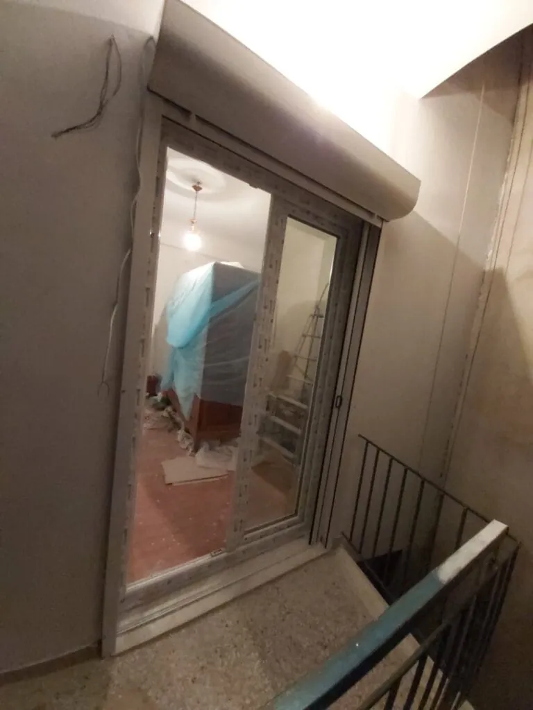 pvc Μπαλκονόπορτα τεχνοπαν